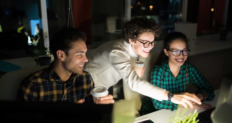 young-entrepreneurs-working-at-night-JVPK98B.jpg